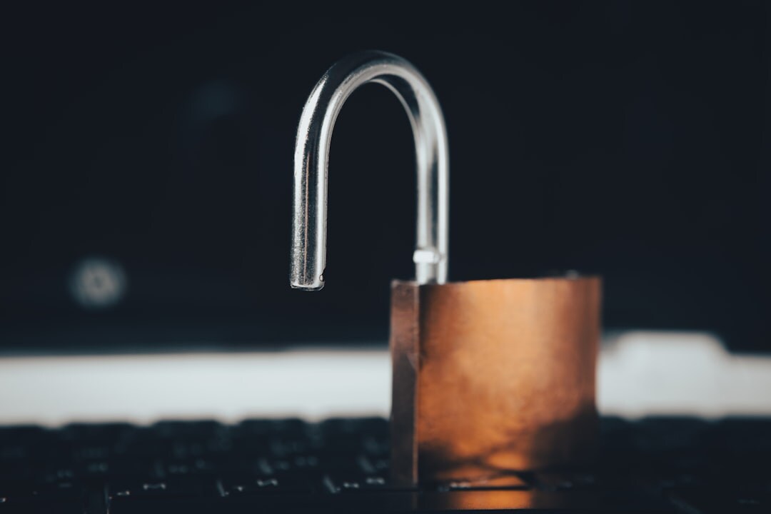 Cybersecurity concept with lock icon and digital code on dark background